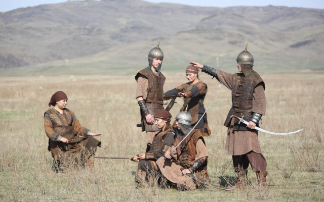 Soldiers stage theatrical performance in costumes of Kazakh khans and batyrs